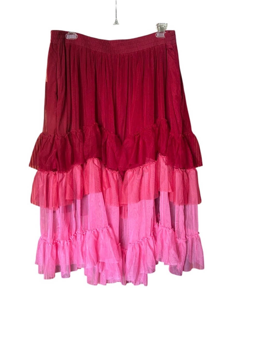 A-line skirt with ruffle tears in burgundy and pink with elastic waist band.